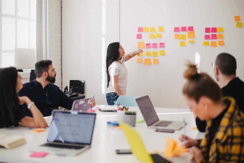 An operations team working together at a desk